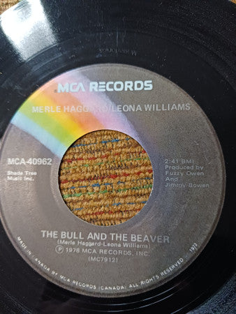 Merle Haggard / Leona Williams : I'm Gettin' High / The Bull And The Beaver (7")