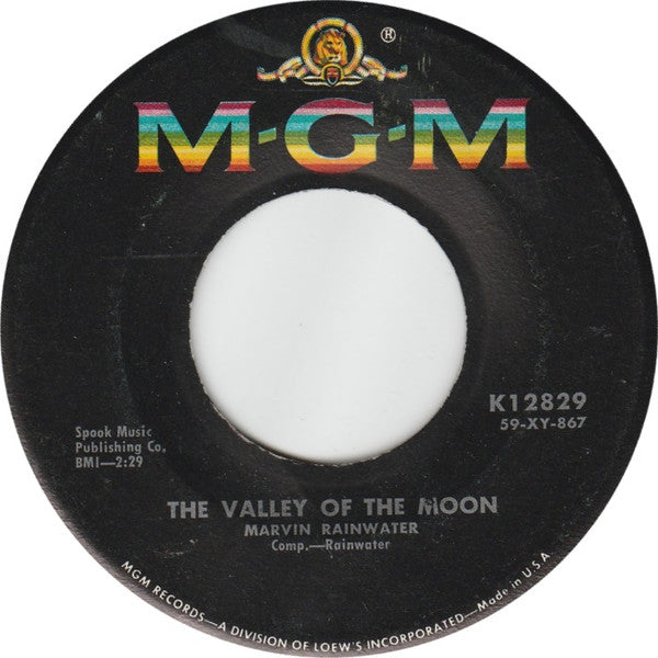 Marvin Rainwater : The Valley Of The Moon / Young Girls (7", Single, bla)