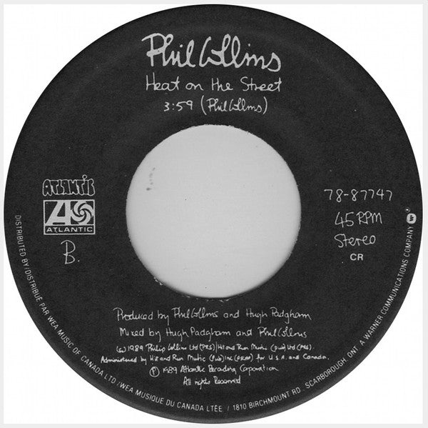 Phil Collins : Another Day In Paradise (7")