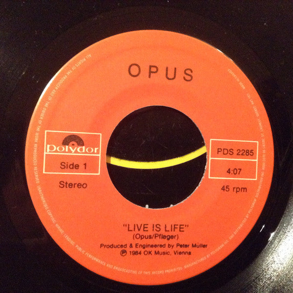 Opus : Live Is Life (7", Single)