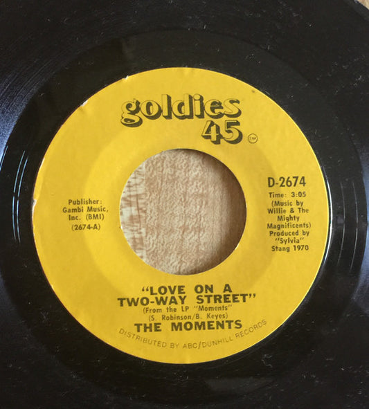 The Moments : Love On A Two-Way Street / I Won't Do Anything (7", Single, RE)