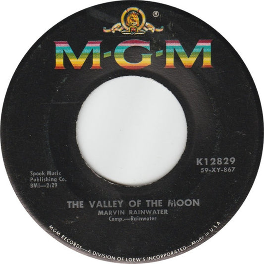 Marvin Rainwater : The Valley Of The Moon / Young Girls (7", Single, bla)