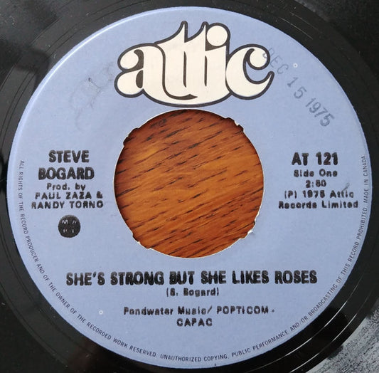 Steve Bogard : She's Strong But She Likes Roses/They Ride Down From The Mountain (7", Single)