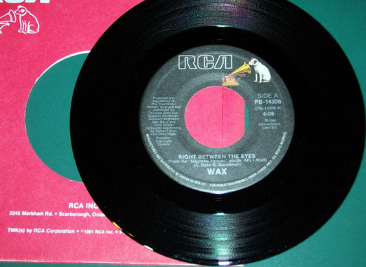 Wax (6) : Right Between The Eyes (7", Single)