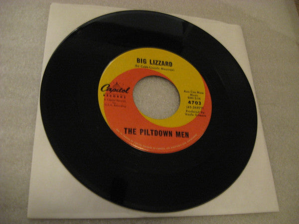 The Piltdown Men : A Pretty Girl Is Like A Melody (7", Single)