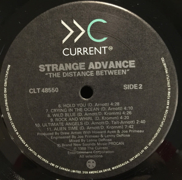 Strange Advance : The Distance Between (LP, Album)