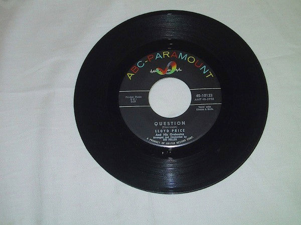 Lloyd Price And His Orchestra : Question / If I Look A Little Blue (7", Single)