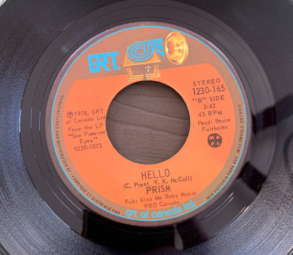 Prism (7) : You're Like The Wind (7", Single)