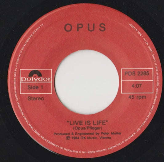 Opus : Live Is Life (7", Single)