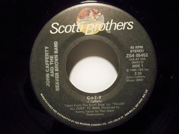 John Cafferty And The Beaver Brown Band : C-I-T-Y / Where The Action Is (7", Single)